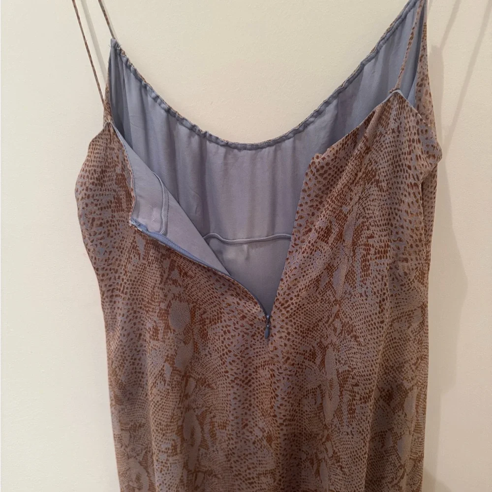 Tahari slip spaghetti strap 100% silk dress. Size 12.
NEWLY dry cleaned. - Picture 9 of 13